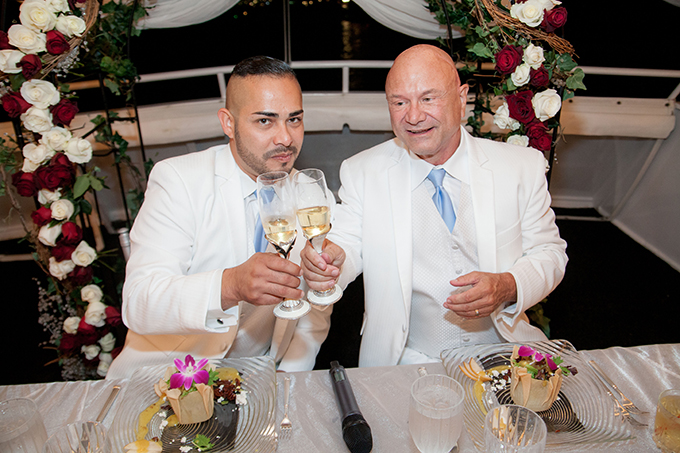 two grooms - cheers! Charter Yachts of Newport Beach