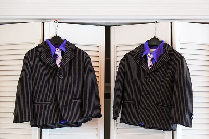 Derek Chad Photography - matching pin stripe suits with radiant orchid