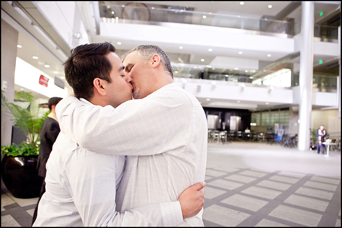 Alison Rose Photography - Candid shot of gay couple kissing