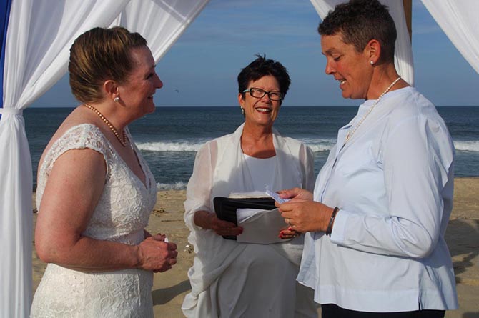 Rev. Tanya Young Venice, Florida Weddings - Lesbian brides exchanging vow