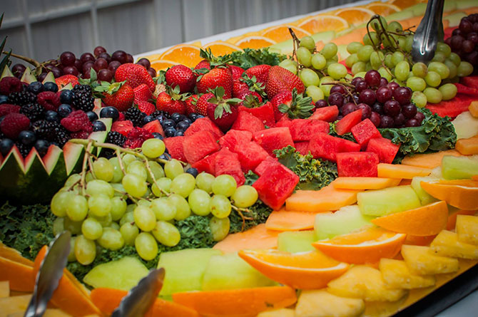 Royal Fiesta Caterers & Event Center - Fresh fruit tray strawberries, grapes, oranges, and watermelon