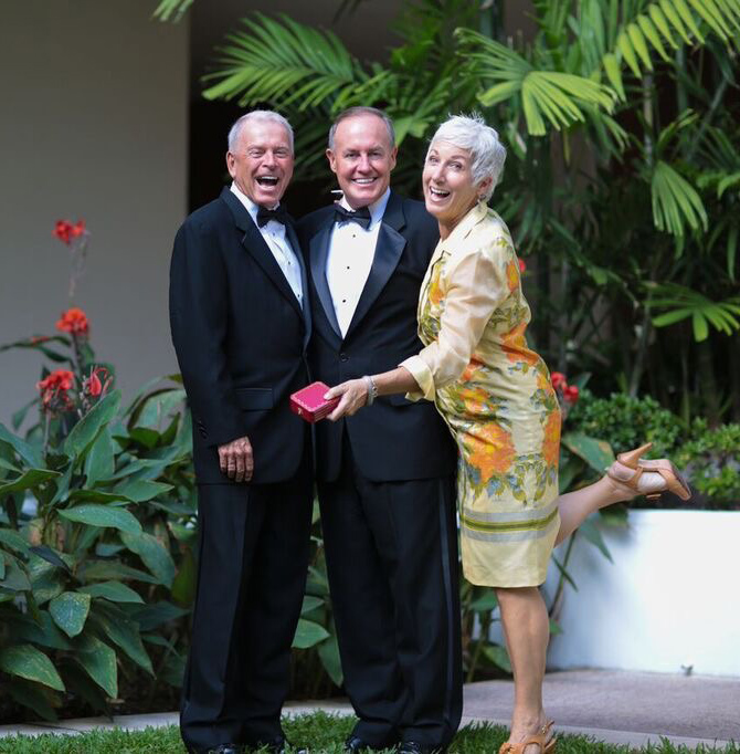 I Do Hawaiian Weddings - Gay couple signing their marriage certificate