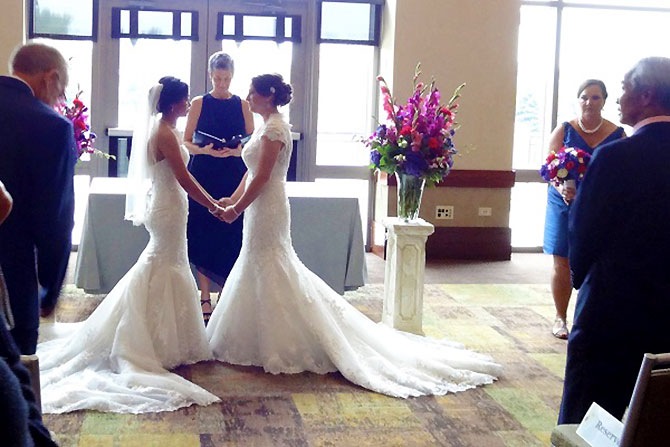 A Perfect Fit Rev - Brides exchanging vows in church ceremony