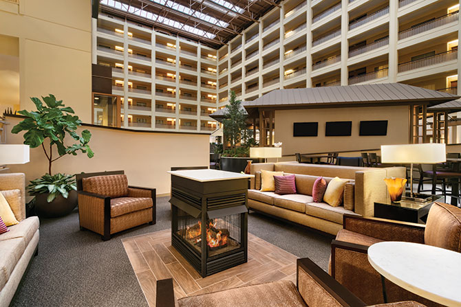 Embassy Suites Chicago - North Shore / Deerfield - Comfortable atrium with restaurant and fireplace