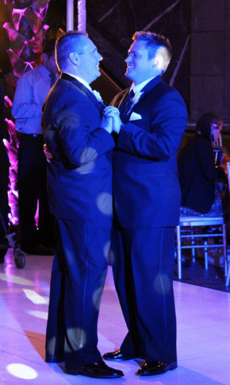 MDM Entertainment - Gay couple dancing and elegant decor