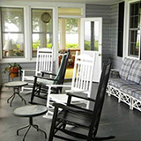 Black Walnut Point Inn - Porch and rocking chairs