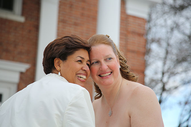 Rick Helman Photography + Video - Candid shot of lesbian brides