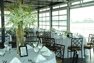 Sunset Terrace at Chelsea Piers traditional white wedding reception