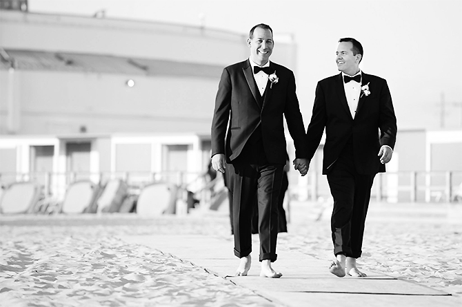 The Sands At Atlantic Beach Atlantic Beach New York black and white photo grooms holding hands