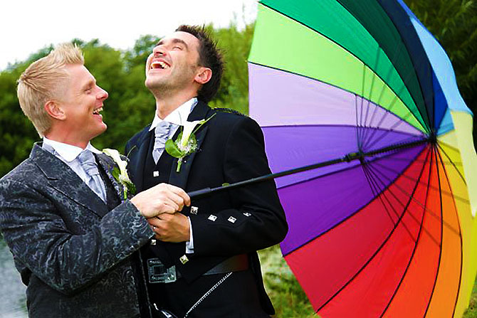 Enlightened Ceremonies - Gay Grooms with Rainbow Umbrella