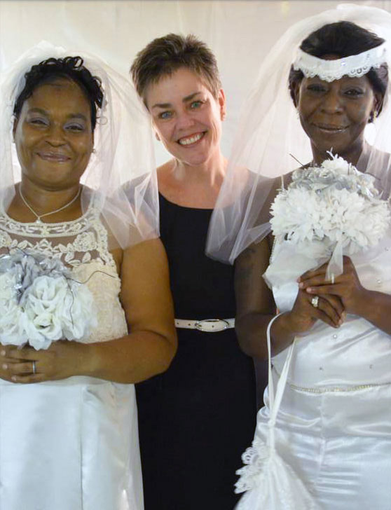 Reverend Kathleen with 2 brides