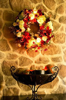 The Inn At Leola Village stone walls with fall centerpiece