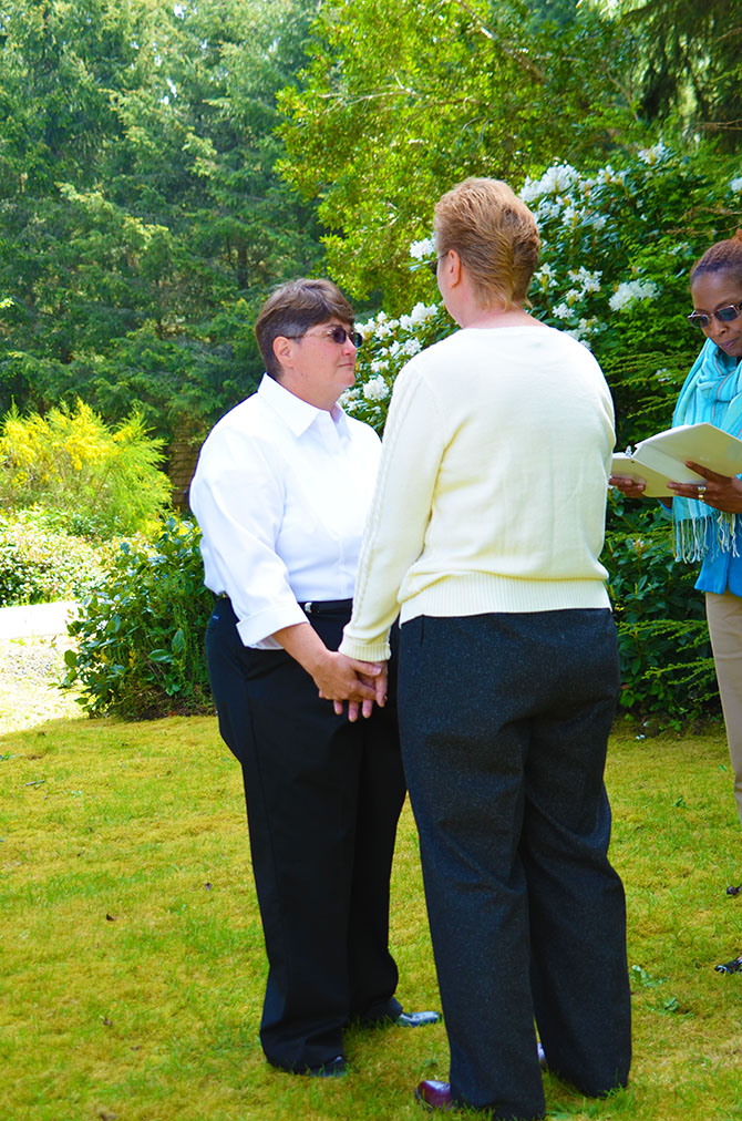 Weddings By The Sea - LGBT couple exchanging vows