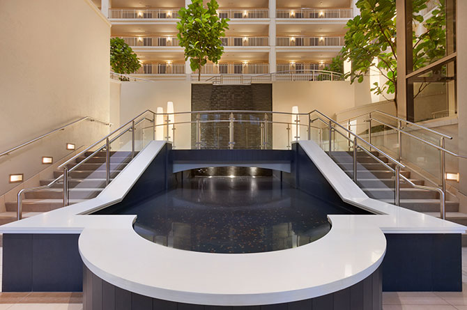 Embassy Suites Chicago - lobby entrance with open atrium and fountains