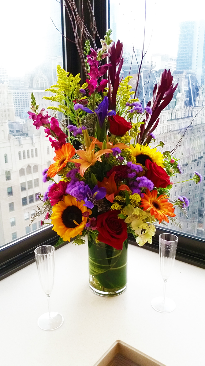 sunflower and bright floral centerpiece - Four Directions Ceremonies Susan E. Stein LGBT Wedding Officiant in PA