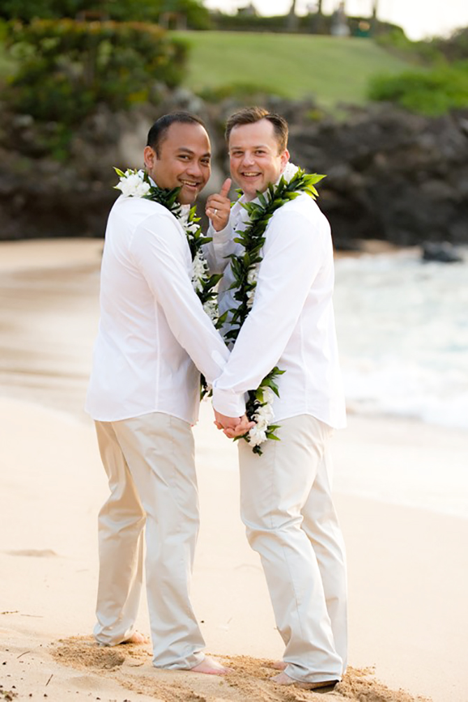 Marry Me Maui Wedding Planners - lgbt grooms holding hands on the beach