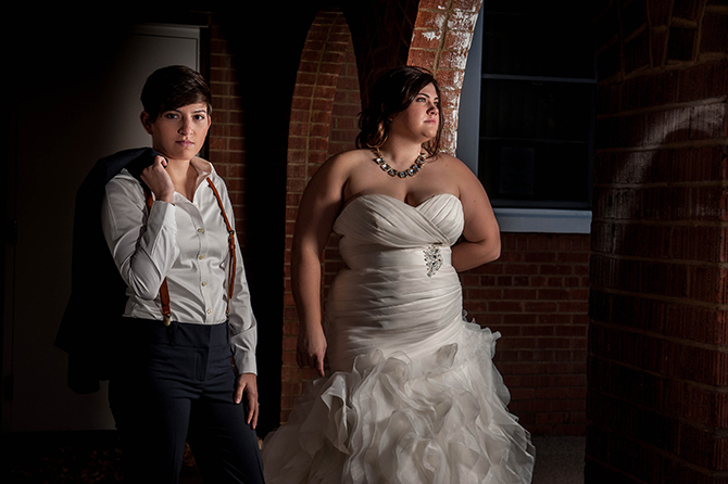 The R2 Studio Phoenix, Arizona bride leaning on brick wall